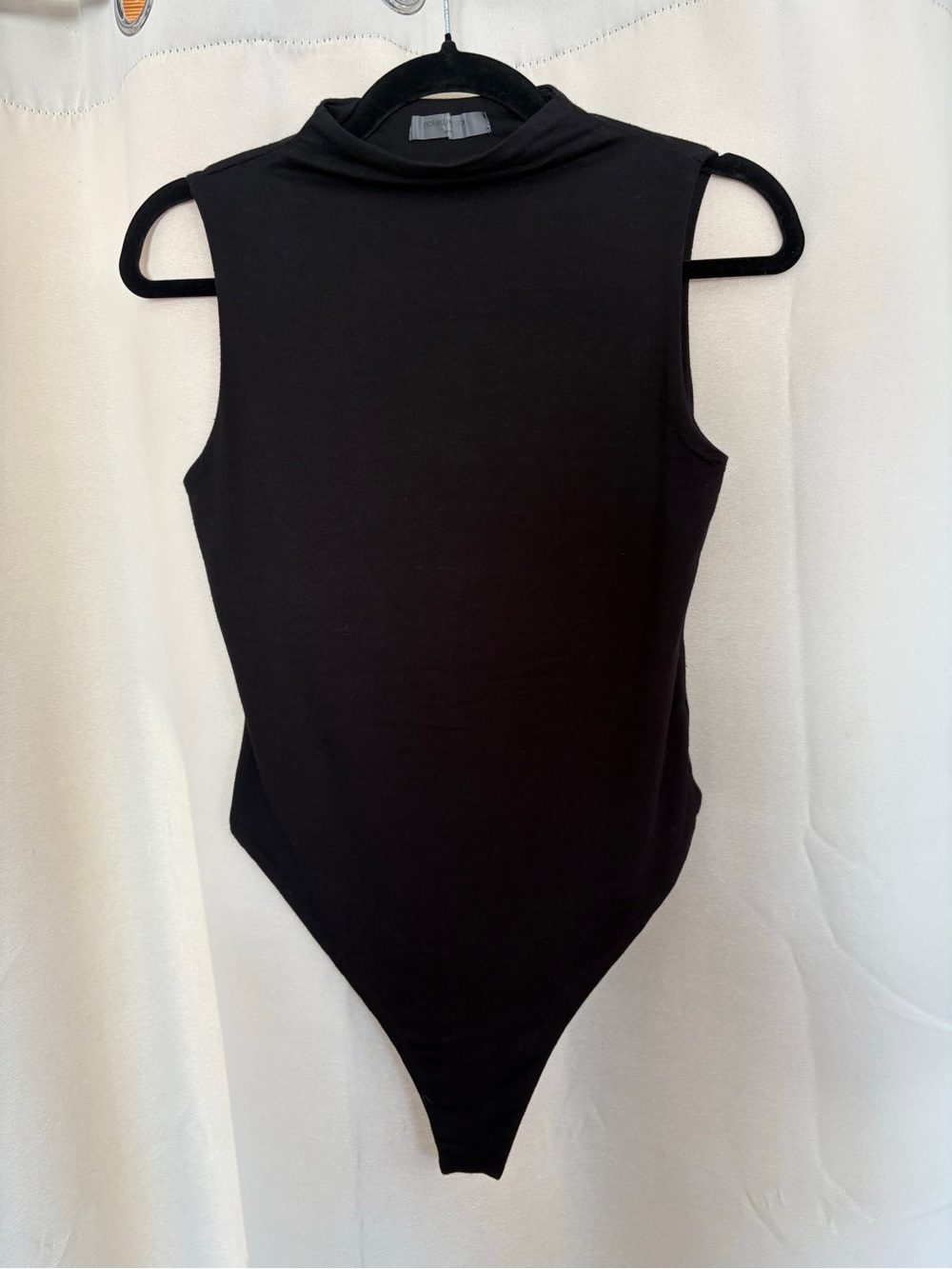naked wardrobe Black Sleeveless Mock Neck Bodysuit